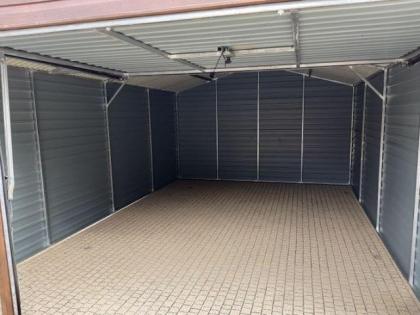 Blechgarage 4x6 mit Satteldach, mit Schwingtoren und Türen