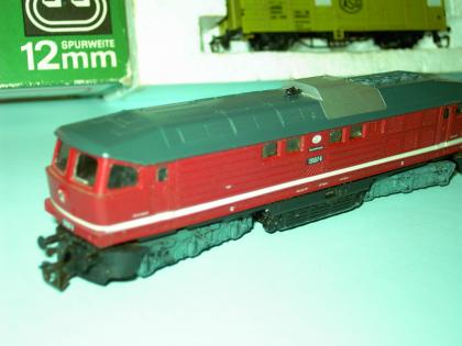 Modelleisenbahn TT;  BR130 (mit Licht) +4 Güterwagen in OVP + Versand