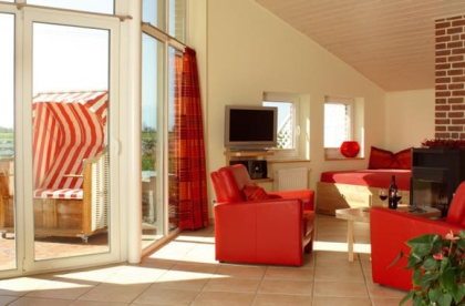 Ferienhaus an der Ostsee auf Fehmarn mit 5-Sternen Sauna und Kamin