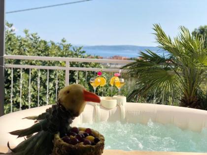 Am Meer  Ferienwohnung mit Terrasse,Whierpool ,Garten,Grill und Parkplatz .